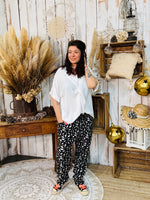 Pantalon Fluide Motif Plume – Plume