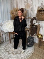 ★ Jean ballon noir – L’allure cool-chic par excellence